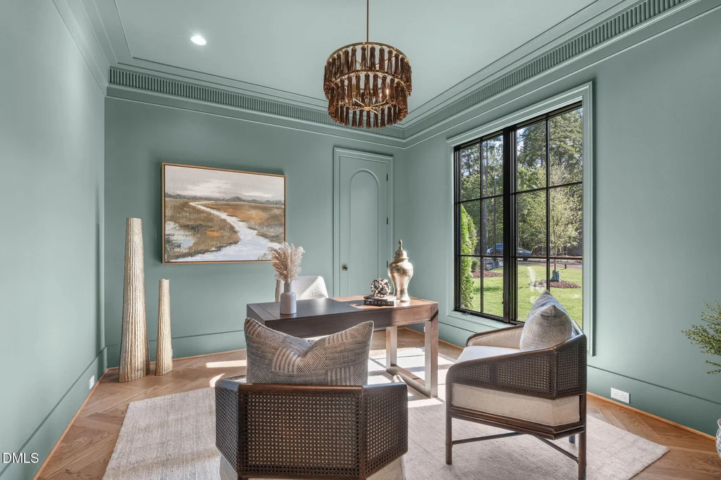 Study Herringbone Hardwood | 6744 Brixley Crest Ct The main-level study features herringbone hardwood floors and a tailored color palette at 6744 Brixley Crest Ct, Raleigh.