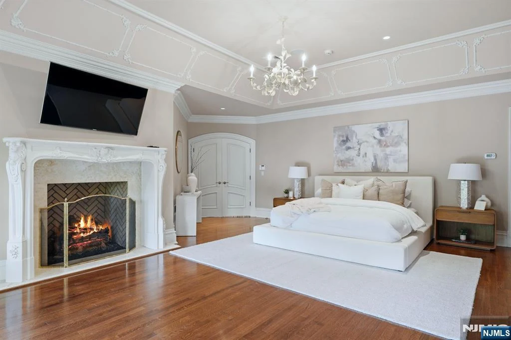 7 Buckingham Drive – Primary Bedroom and Fireplace Primary Bedroom and Fireplace at 7 Buckingham Drive, Alpine, New Jersey