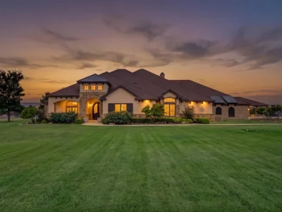 A Lavishly Equipped Shallowater Compound With a 3,629-Square-Foot Guest House Asks $2,500,000 1 Main Residence at Twilight at 8009 FM 2641, Shallowater, Texas