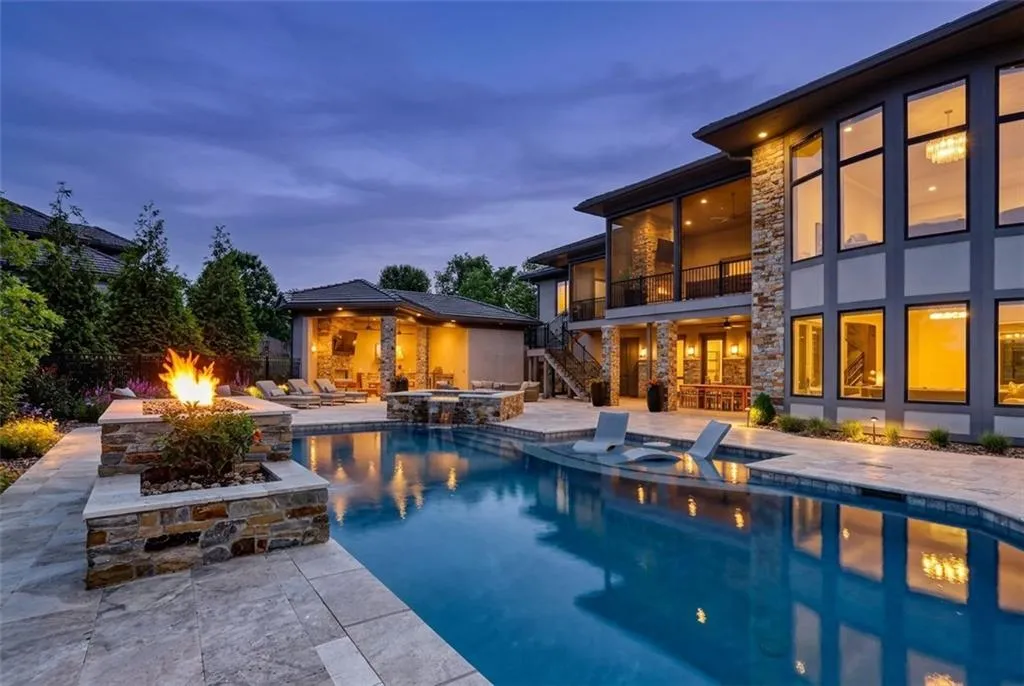 Striking Parkville Estate with a Floating Staircase and Fire-and-Water Pool Asks $3,550,000 3 8085 NW Green Glades Ct Parkville MO 6415203