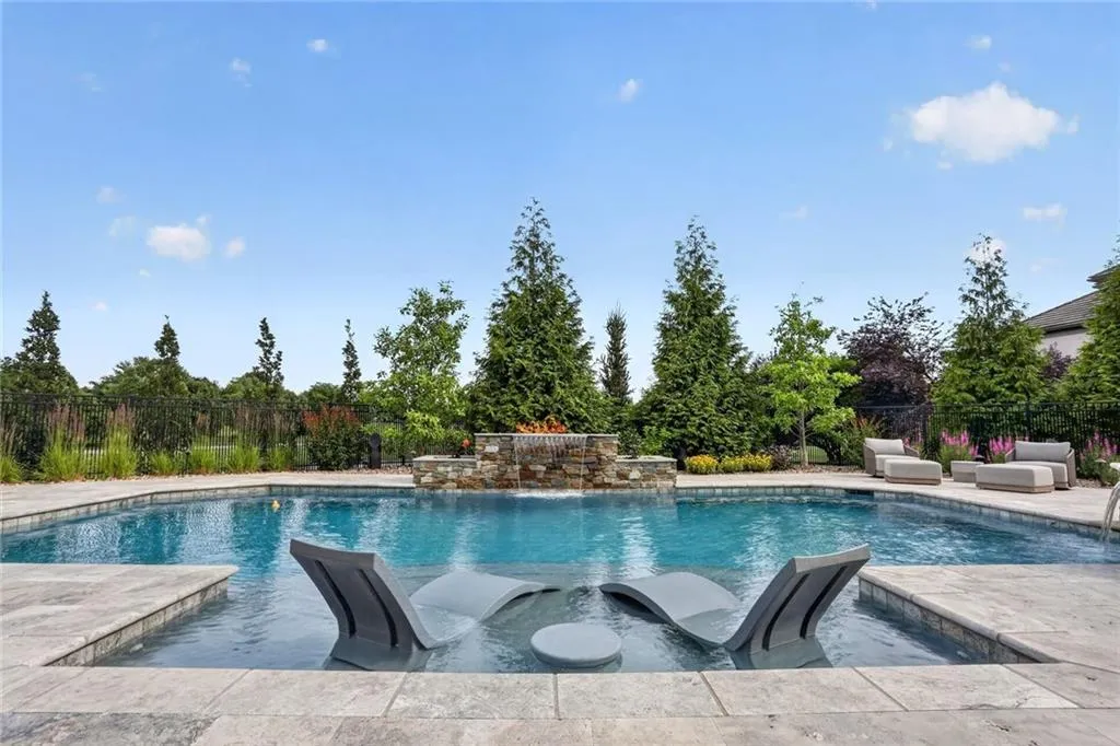 Striking Parkville Estate with a Floating Staircase and Fire-and-Water Pool Asks $3,550,000 27 8085 NW Green Glades Ct Parkville MO 6415229