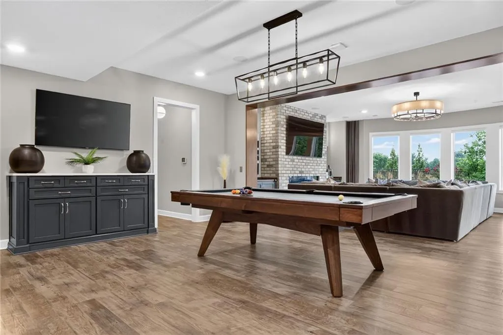 Striking Parkville Estate with a Floating Staircase and Fire-and-Water Pool Asks $3,550,000 21 8085 NW Green Glades Ct Parkville MO 6415251