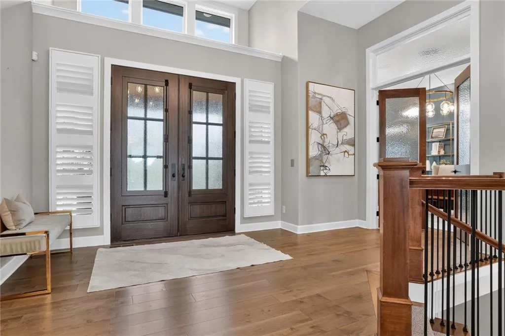 Striking Parkville Estate with a Floating Staircase and Fire-and-Water Pool Asks $3,550,000 5 8085 NW Green Glades Ct Parkville MO 6415271