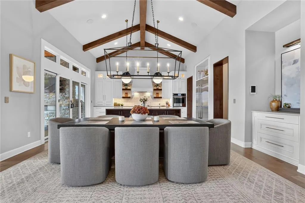 Striking Parkville Estate with a Floating Staircase and Fire-and-Water Pool Asks $3,550,000 7 8085 NW Green Glades Ct Parkville MO 6415280